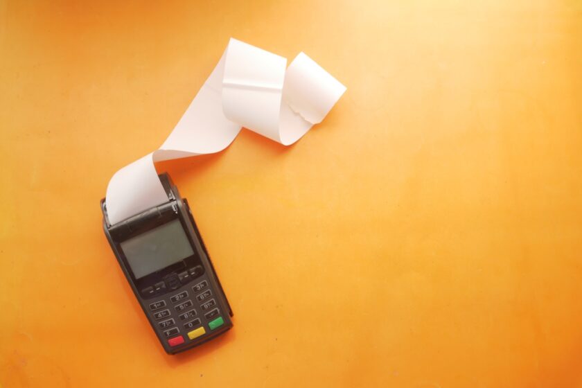 calculator with paper receipts