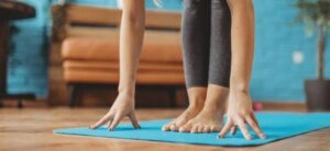 woman practising yoga at home i