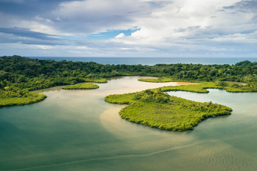 Panama.Tropical Island Aerial View. Wild coastline lush exotic green jungle. Red Frog Beach in Bastimentos Island, Bocas del Toro, Central America, Panama.