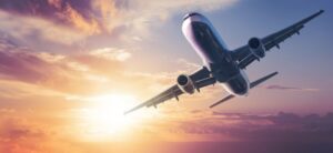 airplane against a colourful sunset