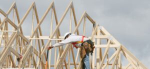 person working on building a house