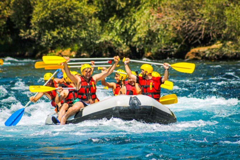 People white water rafting