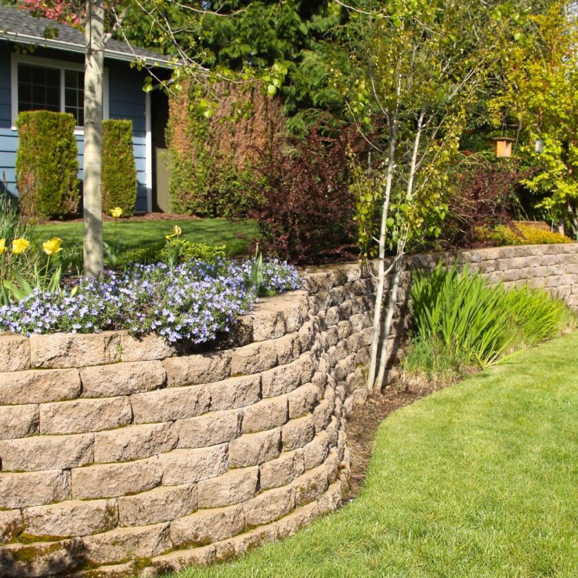 stone wall in a landscaped garden