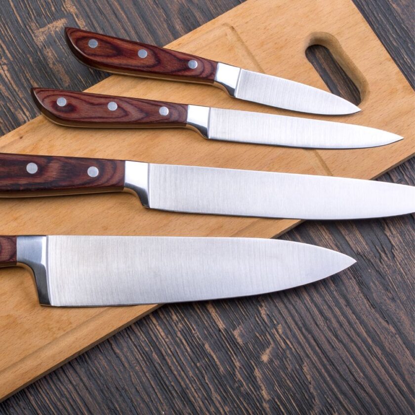 kitchen knives on a cutting board
