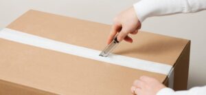 opening box with utility knife