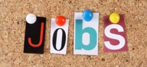 the word job on a pinboard