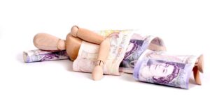 wooden doll wrapped