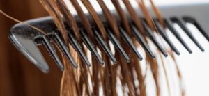 comb being brushed through wet