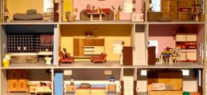 dolls house with multiple rooms on show