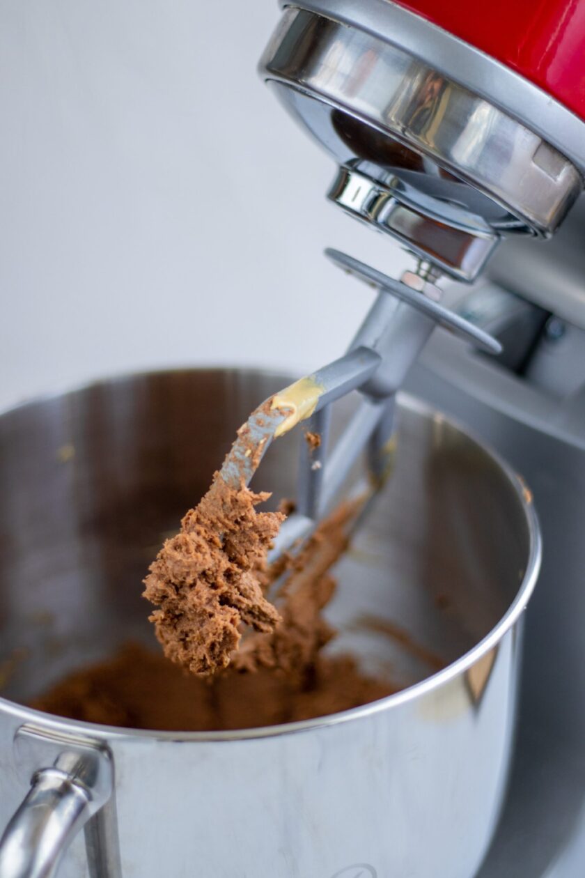red food mixer with batter inside