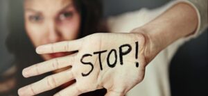 woman with stop on her hand