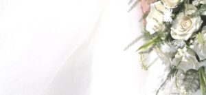 bouquet and white wedding dress