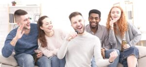 friendship group singing karaoke at home
