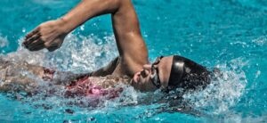 person swimming in a pool