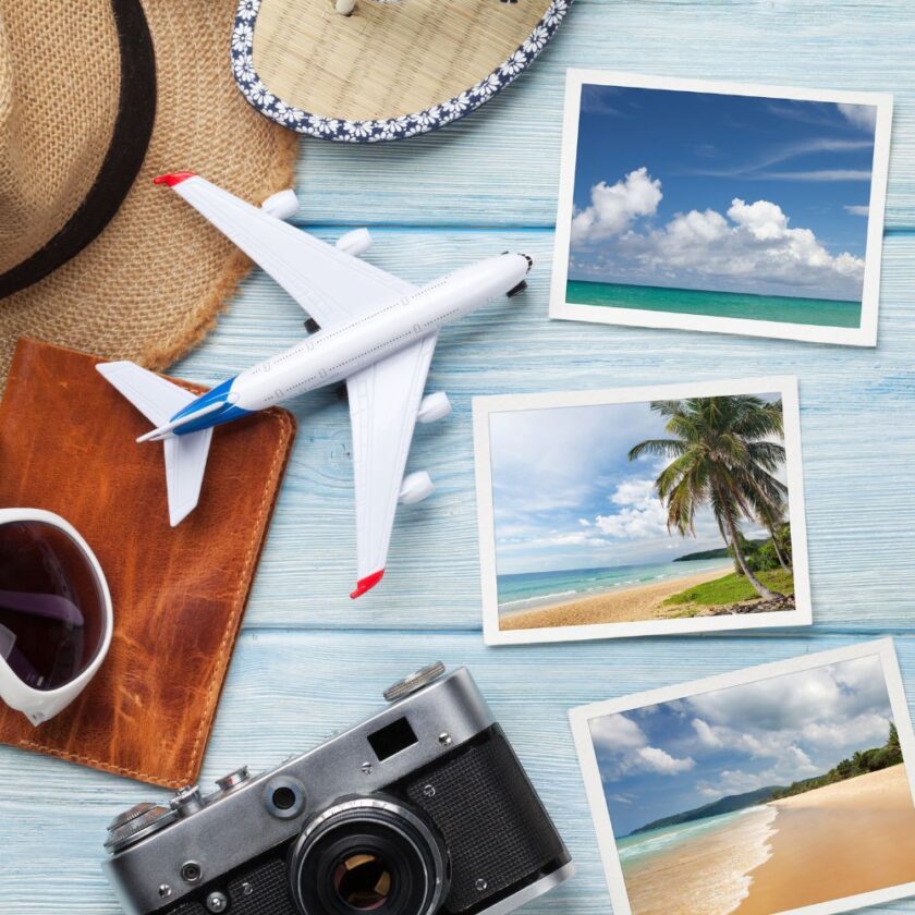travel holiday concept with camera photos and hat