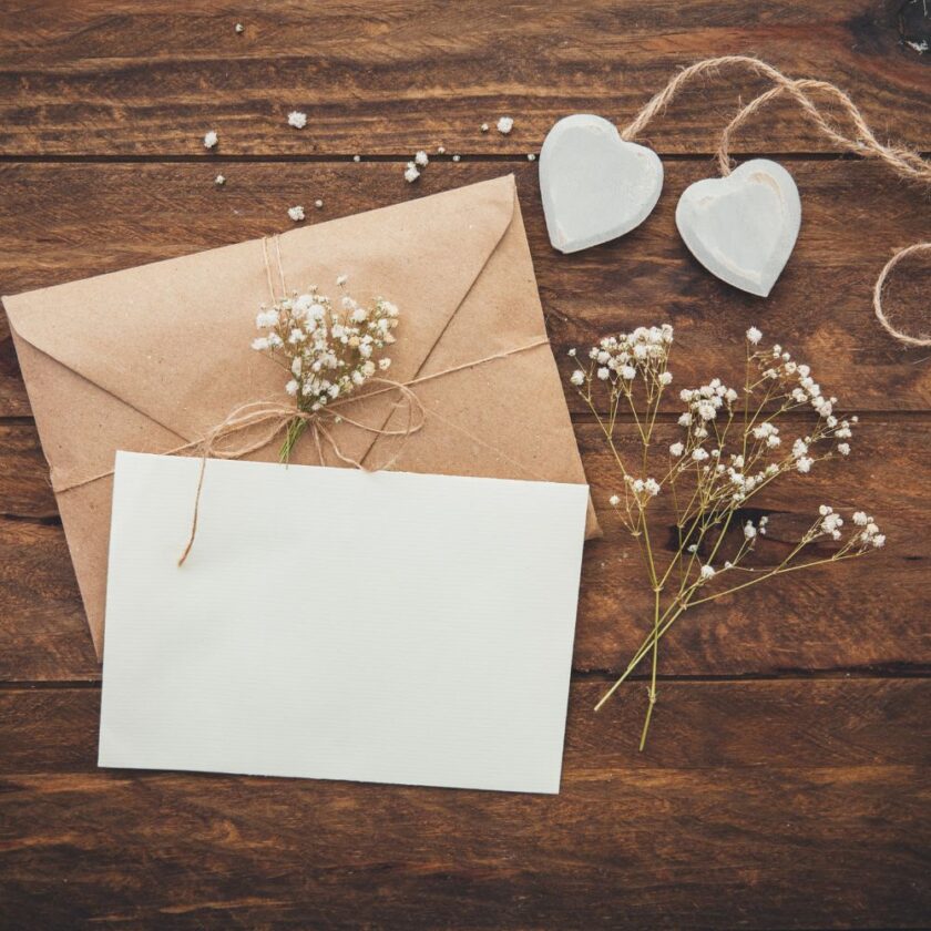 wedding invitation with small white flowers