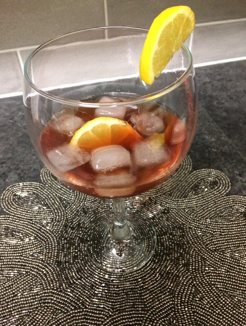 Gin in a Tin Sloe Gin with Ice and Lemon