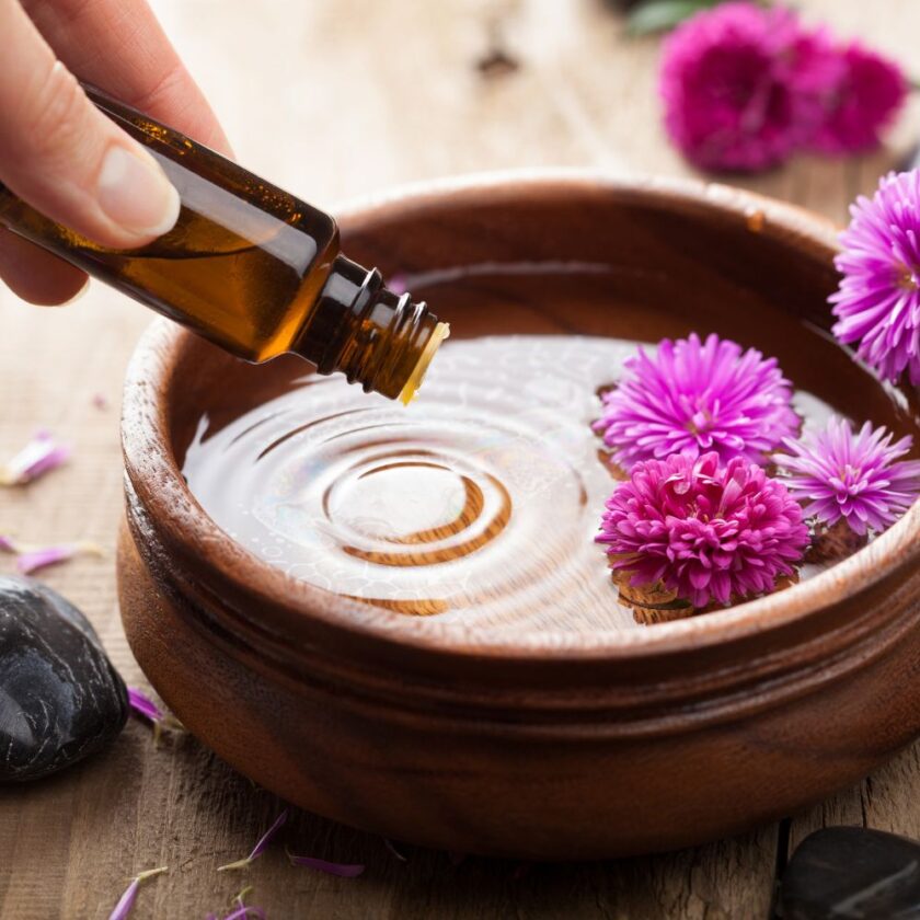 aromatherapy oils being mixed in a bowl