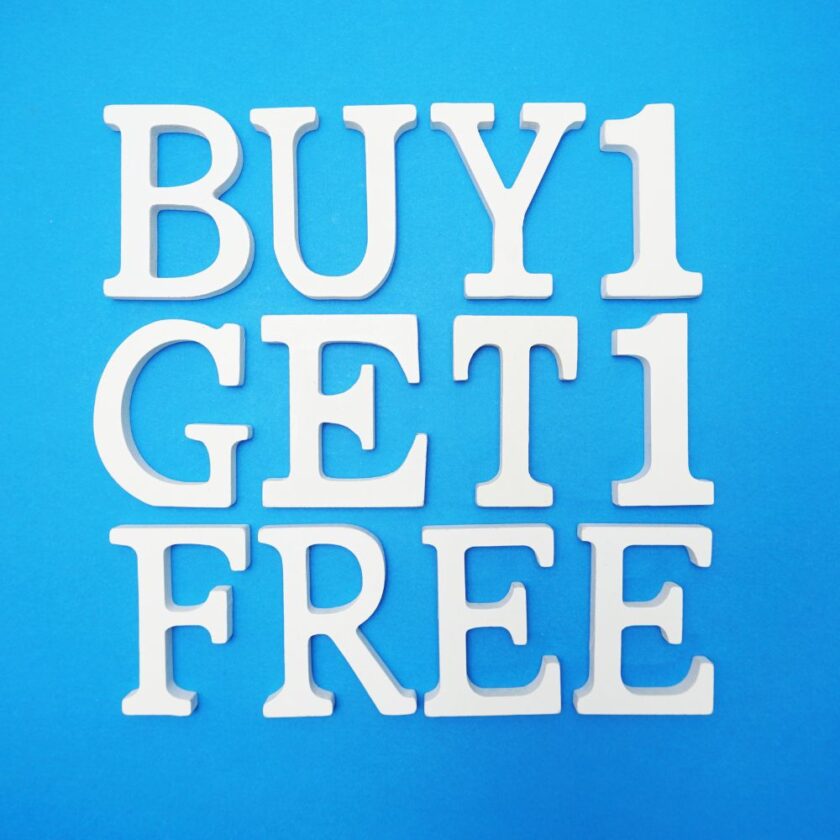 buy 1 get 1 free on a blue back ground 