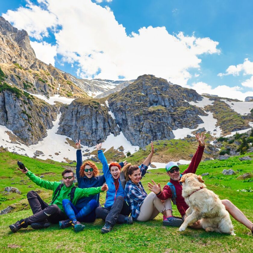 friends travelling with each other and dog