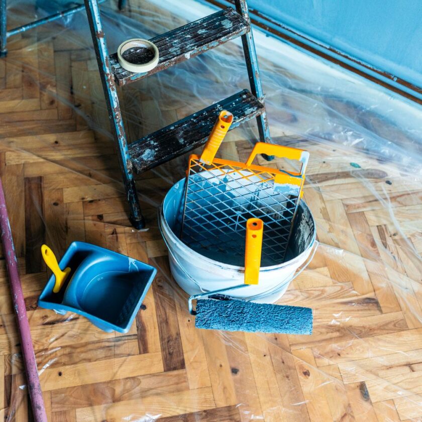 home improvement tools and a ladder