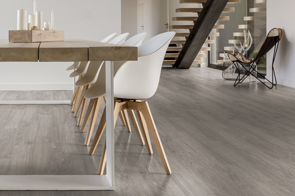 Chairs by a table with flooring on show