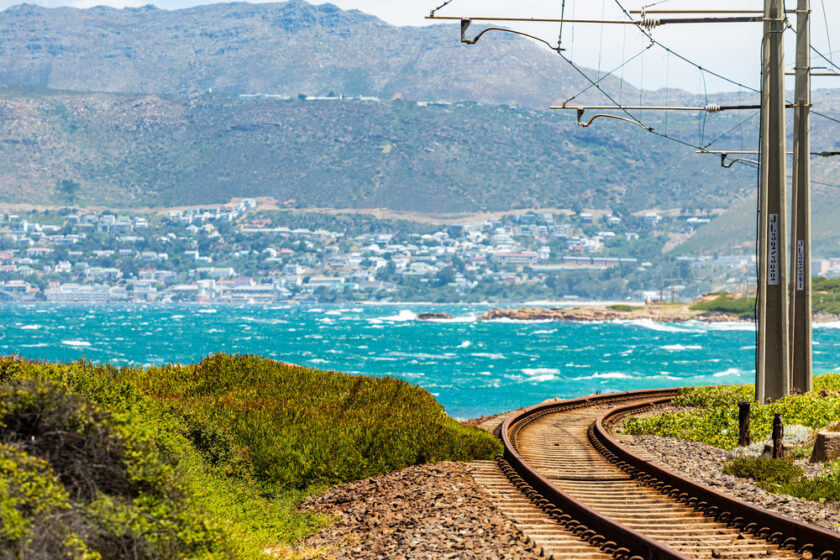 Electric Passenger Railway line on the shoreline of False Bay, Cape Town South Africa