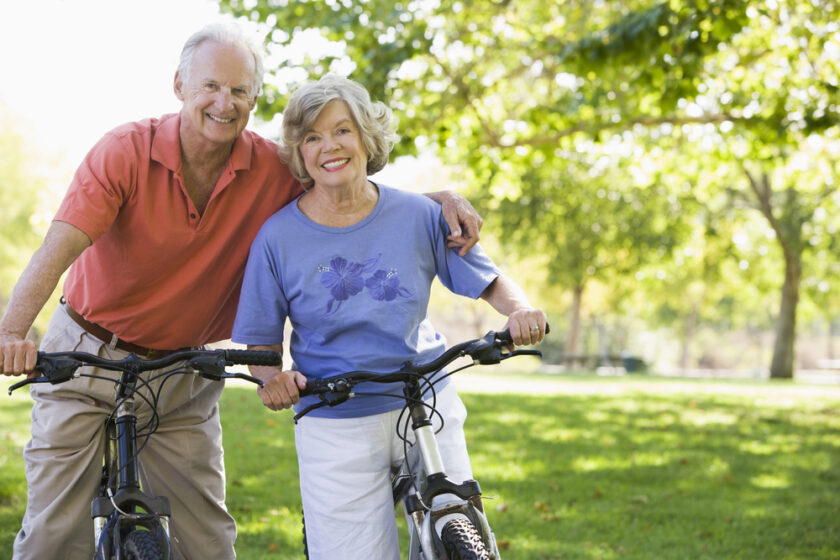Senior couple on cycle ride in countryside