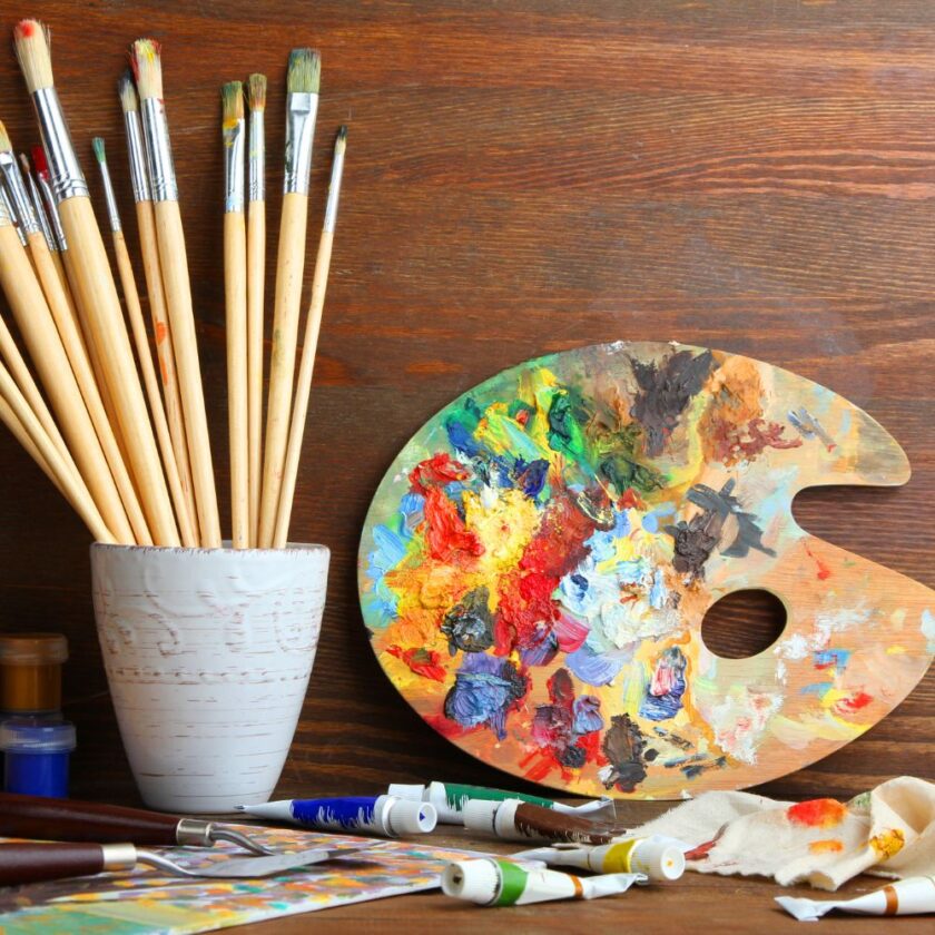 art supplies including brushes paints and palette