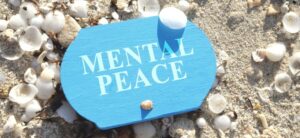 tag saying mental peace on a back backdrop
