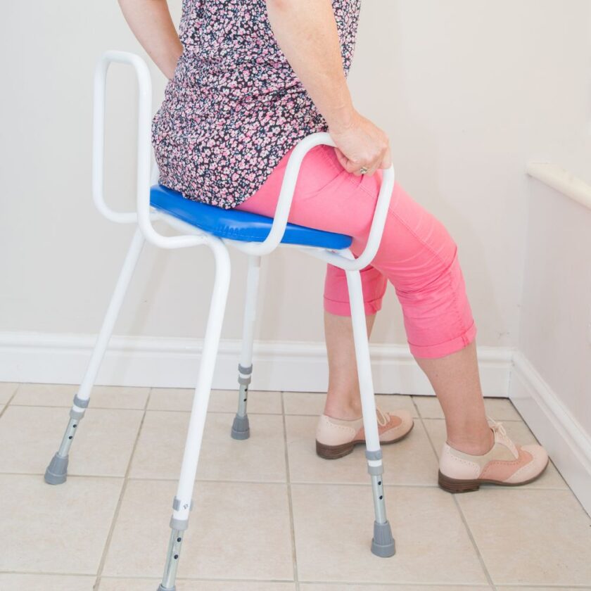 Person sat on a perching stool