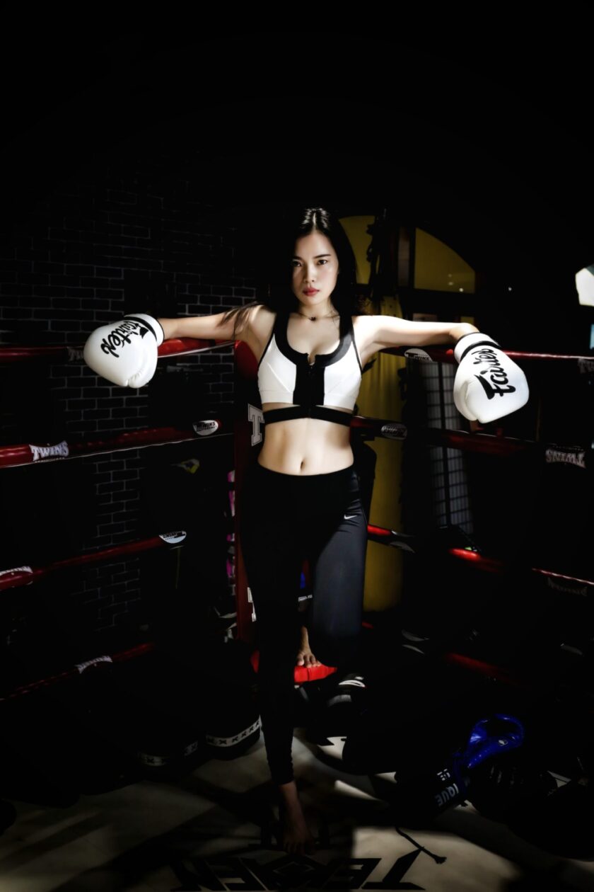 Woman wearing boxing gloves
