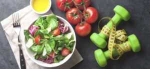 healthy salad and fitness equipment