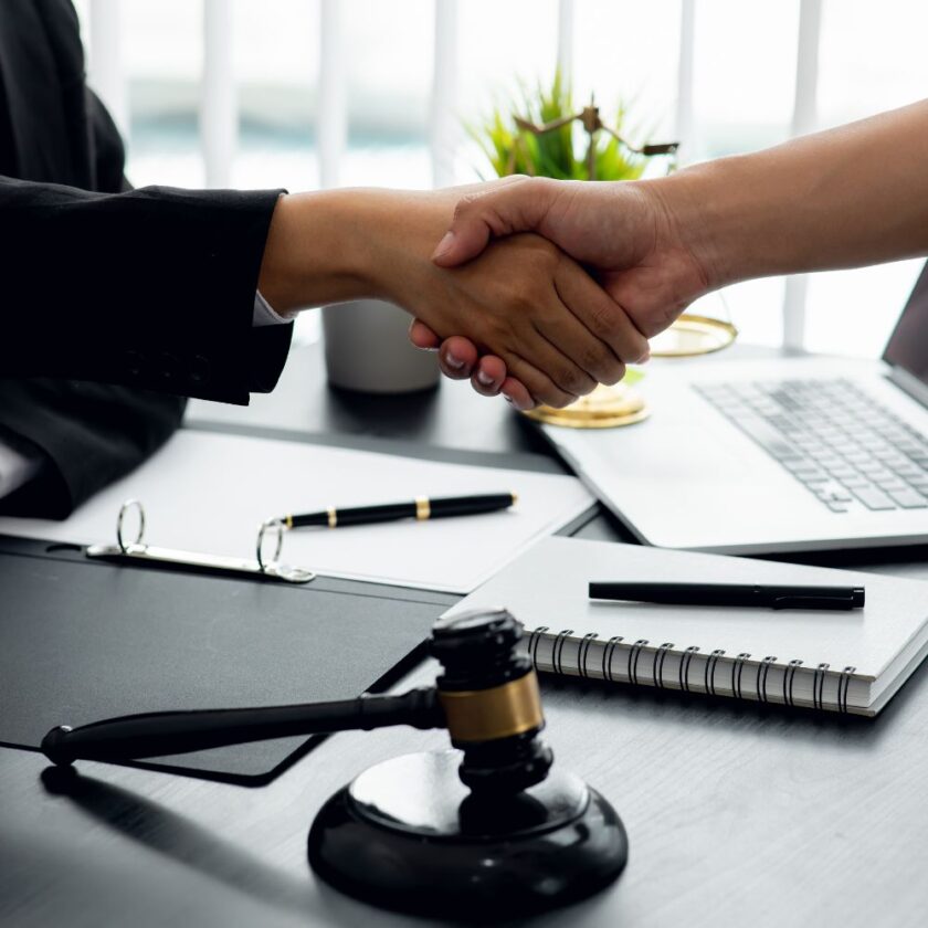 lawyer and client shaking hands