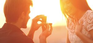 marriage proposal at sunset