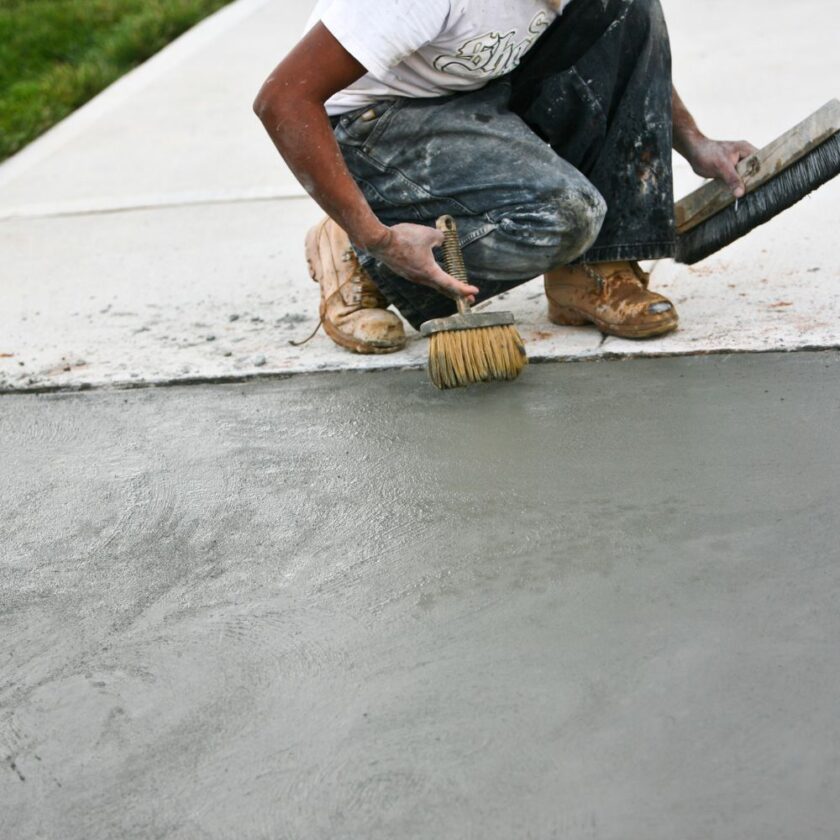 person working on installing an Asphalt Driveway