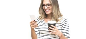 Smiling Woman Looking at Mobile Phone