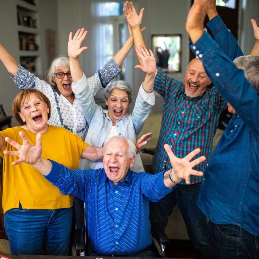 group of older people looking happy