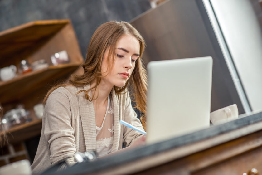 Small business owner working at a her laptop