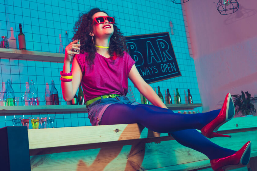 Woman sat on a bar