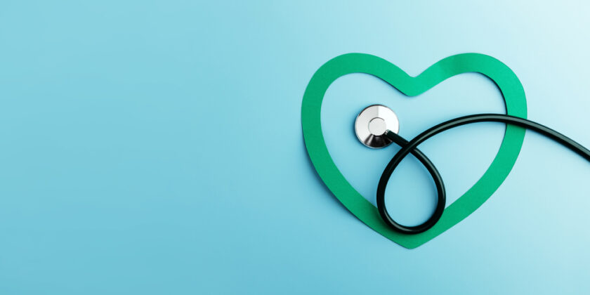 Health Care Awareness Concept. International World Heart Day. Paper Cut as Heart Shape with Stethoscope in Top View. Life, Love and Care for Heart and Cardiovascular