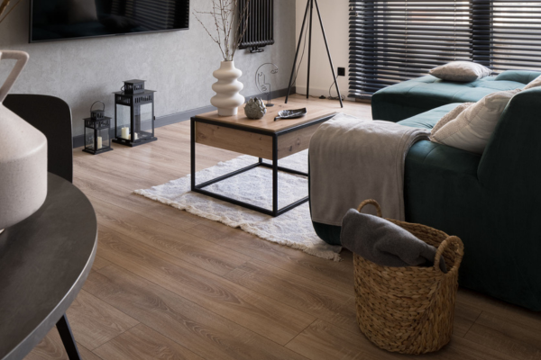 Living room area with wood effect flooring