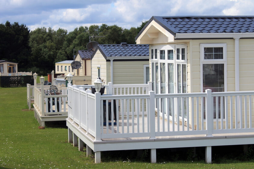 Scenic view of static caravan trailer homes in park.
