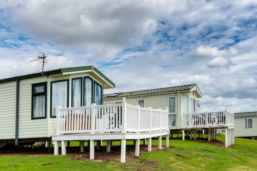 Caravan holiday park with white mobile houses, typical resort of English seaside.
