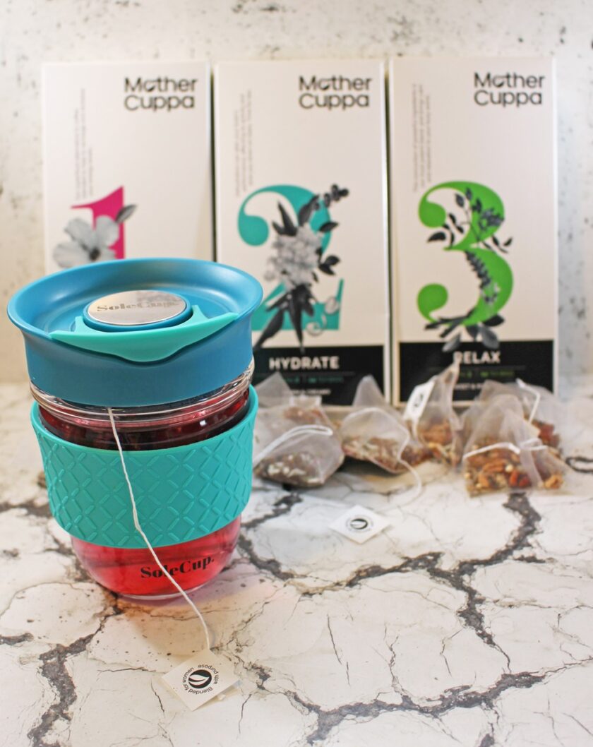 Mother Cuppa Wellness Collection boxes with a cup of number 1