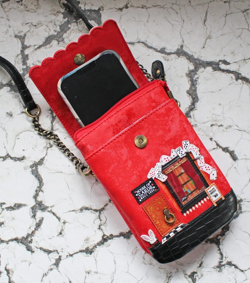 Vendula London House of Cards Magic Shop Phone Pouch With IPhone 13 inside