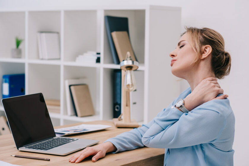woman struggling with neck ache