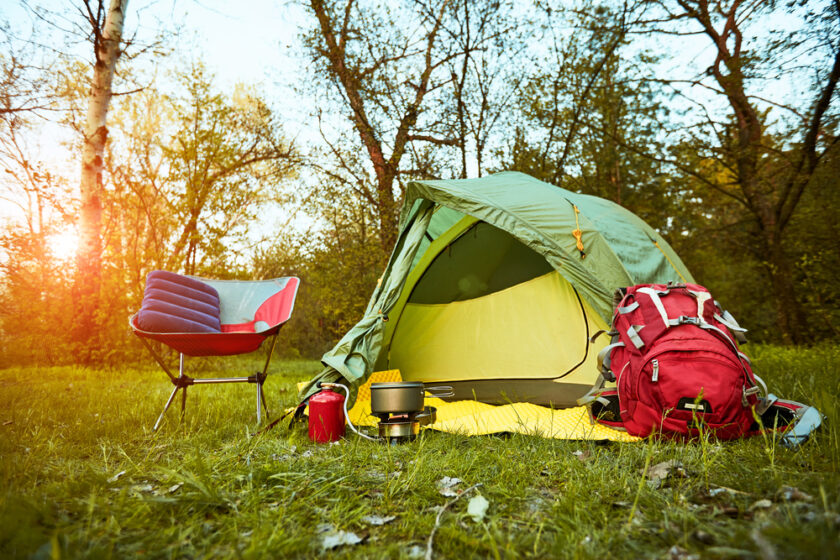Camping in the forest on a beautiful meadow in spring.