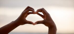 hands held in a heart shape