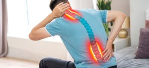 person struggling with a painful back